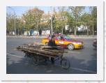 Le vélo transporte planche